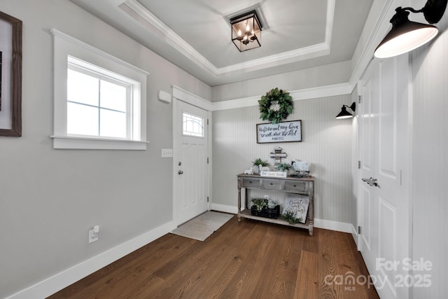 2853 Mathis Church Rd, Catawba, NC 28609 - entrance foyer with dark wood-style flooring, baseboards, ornamental molding, and a tray ceiling