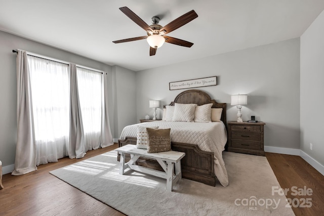 2853 Mathis Church Rd, Catawba, NC 28609 - bedroom with baseboards, wood finished floors, and ceiling fan