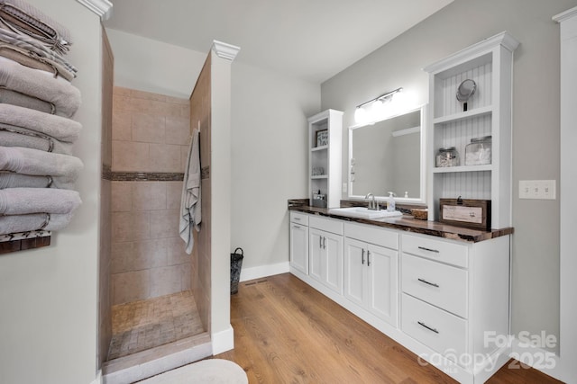 2853 Mathis Church Rd, Catawba, NC 28609 - bathroom with a walk in shower, vanity, and wood finished floors