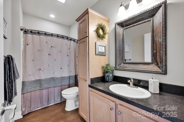 2853 Mathis Church Rd, Catawba, NC 28609 - bathroom with toilet, wood finished floors, vanity, curtained shower, and recessed lighting