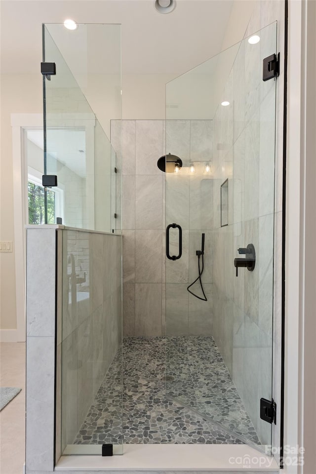 full bathroom featuring recessed lighting and a stall shower