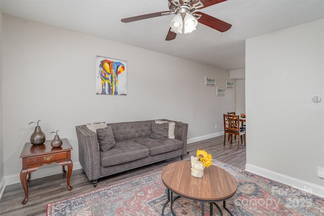 1512 Seigle Ave Unit 2, Charlotte, NC 28205 - living area with wood finished floors, a ceiling fan, and baseboards