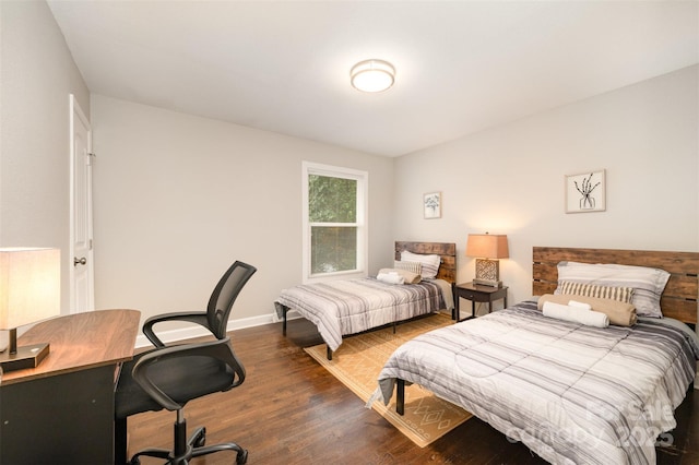1512 Seigle Ave Unit 2, Charlotte, NC 28205 - bedroom with wood finished floors, a desk, and baseboards