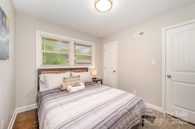 1512 Seigle Ave Unit 2, Charlotte, NC 28205 - bedroom featuring baseboards and wood finished floors