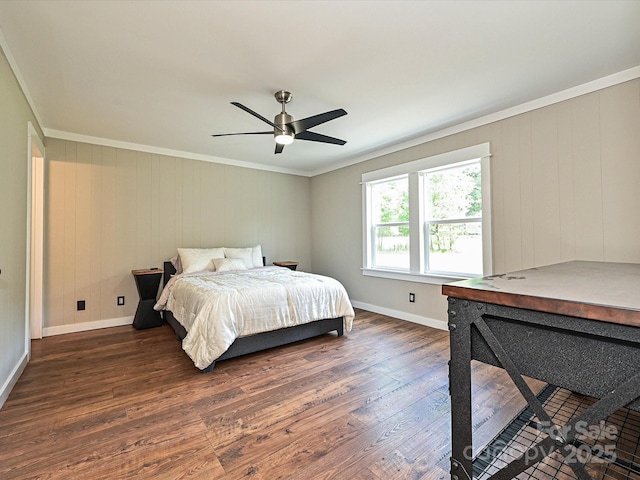 bedroom featuring crown molding, baseboards, a ceiling fan, and dark wood-type flooring