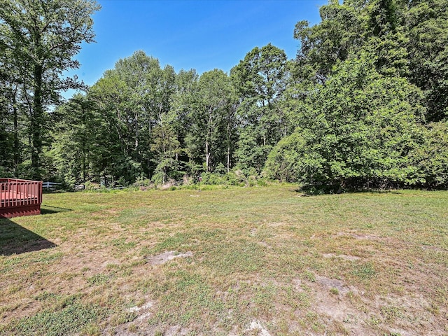 view of yard with a deck