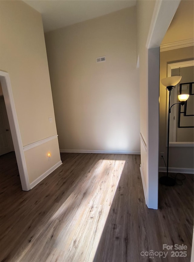 5601 Carmel Station Ave, Charlotte, NC 28226 - unfurnished bedroom featuring wood finished floors and baseboards