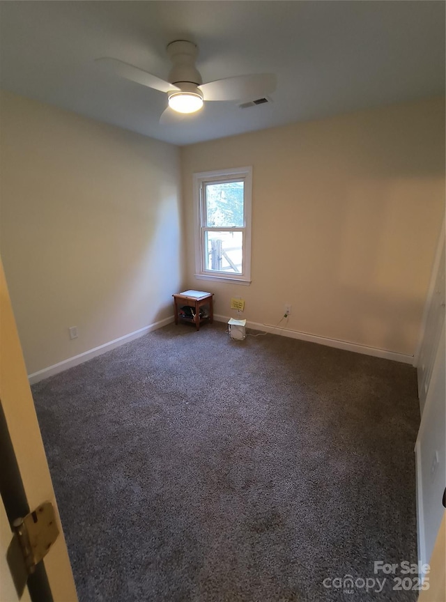 5601 Carmel Station Ave, Charlotte, NC 28226 - unfurnished room with ceiling fan, dark carpet, and baseboards