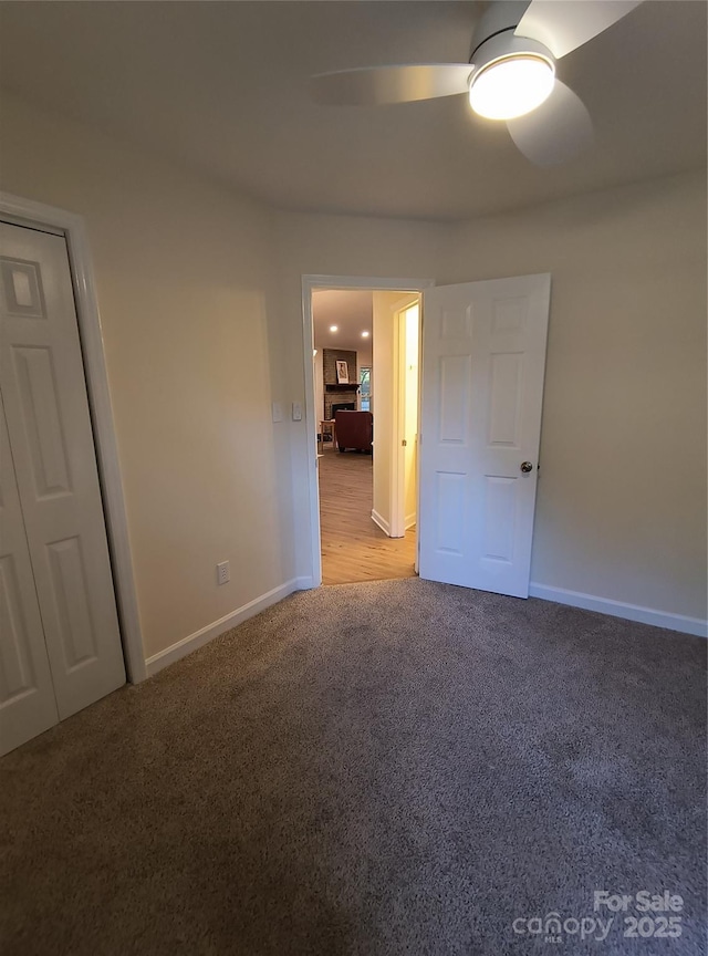 5601 Carmel Station Ave, Charlotte, NC 28226 - unfurnished room featuring light colored carpet, ceiling fan, and baseboards