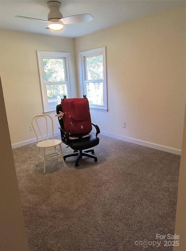 5601 Carmel Station Ave, Charlotte, NC 28226 - living area featuring carpet floors, a ceiling fan, and baseboards
