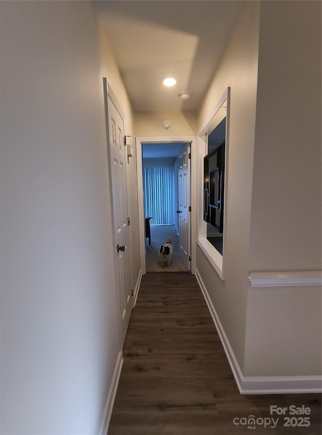 5601 Carmel Station Ave, Charlotte, NC 28226 - corridor featuring wood finished floors and baseboards