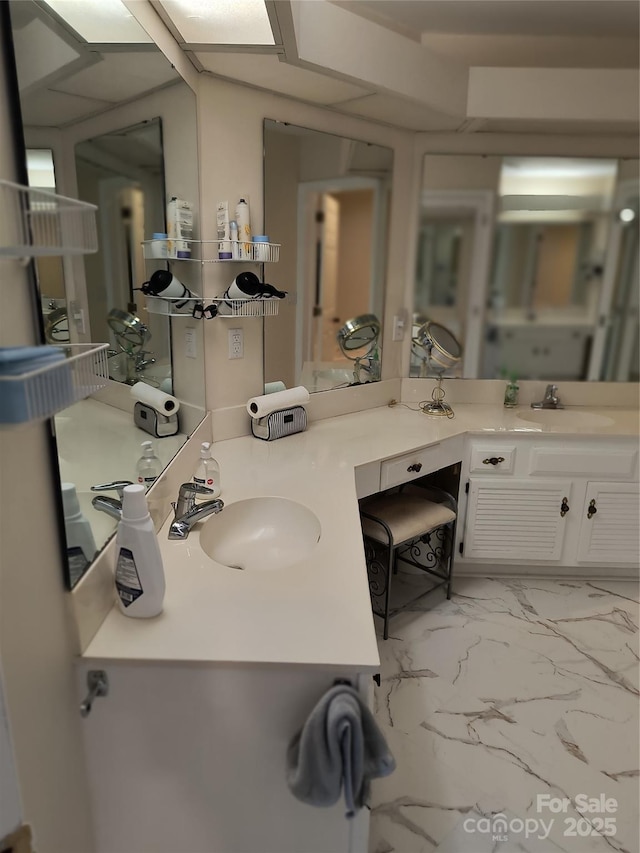 5601 Carmel Station Ave, Charlotte, NC 28226 - bathroom featuring vanity and marble look tile flooring