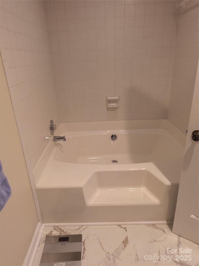 5601 Carmel Station Ave, Charlotte, NC 28226 - bathroom featuring marble look tiles