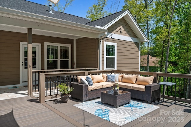 deck featuring outdoor lounge area