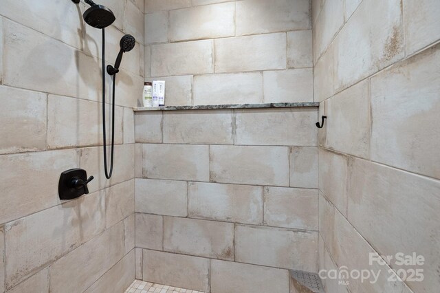 room details with a tile shower
