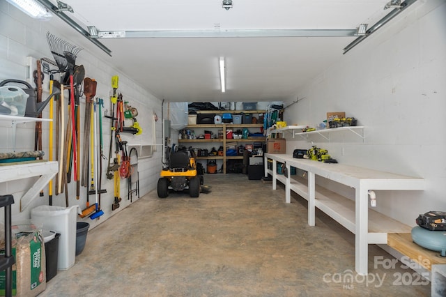 garage with a workshop area
