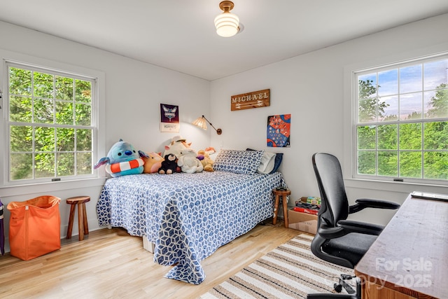92 Rose Hill Rd, Asheville, NC 28803 - bedroom with wood finished floors and an office area