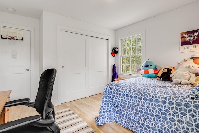 92 Rose Hill Rd, Asheville, NC 28803 - bedroom with wood finished floors and a closet