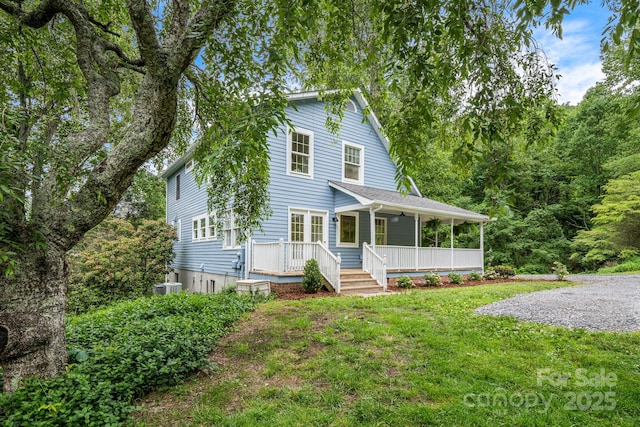 92 Rose Hill Rd, Asheville, NC 28803 - view of front facade with covered porch, a front lawn, and central AC unit