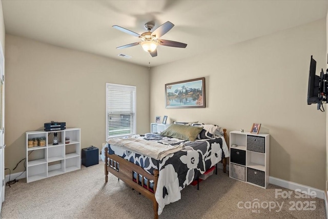 1011 Potomac Rd, Indian Trail, NC 28079 - carpeted bedroom featuring a ceiling fan and baseboards