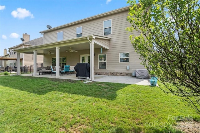 1011 Potomac Rd, Indian Trail, NC 28079 - back of property featuring a ceiling fan, a patio area, outdoor lounge area, and a chimney