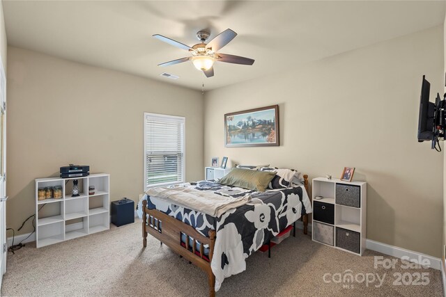 1011 Potomac Rd, Indian Trail, NC 28079 - carpeted bedroom featuring a ceiling fan and baseboards