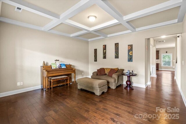 1011 Potomac Rd, Indian Trail, NC 28079 - living area with wood-type flooring, coffered ceiling, and beamed ceiling