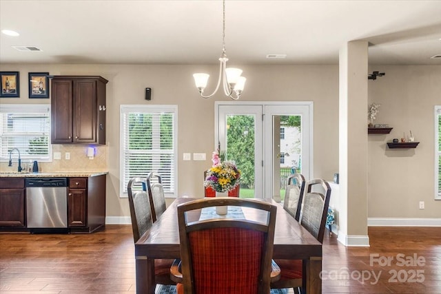 1011 Potomac Rd, Indian Trail, NC 28079 - dining space with a chandelier, dark wood finished floors, healthy amount of natural light, and recessed lighting