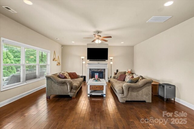 1011 Potomac Rd, Indian Trail, NC 28079 - living room with ceiling fan, dark wood finished floors, a fireplace, and recessed lighting