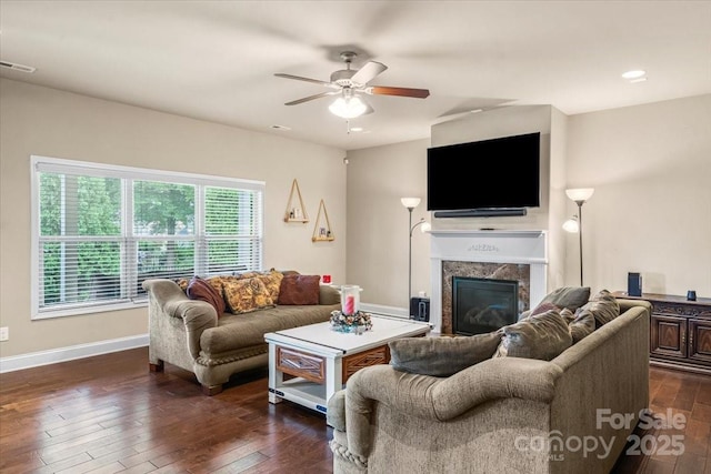 1011 Potomac Rd, Indian Trail, NC 28079 - living area with a premium fireplace, dark wood finished floors, and ceiling fan