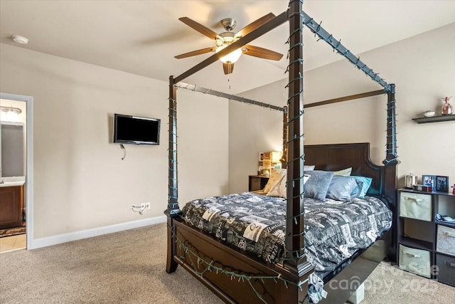 1011 Potomac Rd, Indian Trail, NC 28079 - bedroom with carpet flooring, a ceiling fan, and connected bathroom