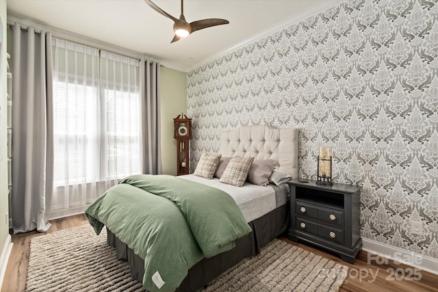 1260 Thomas Knapp Pkwy, Fort Mill, SC 29715 - bedroom with crown molding, baseboards, wallpapered walls, and wood finished floors