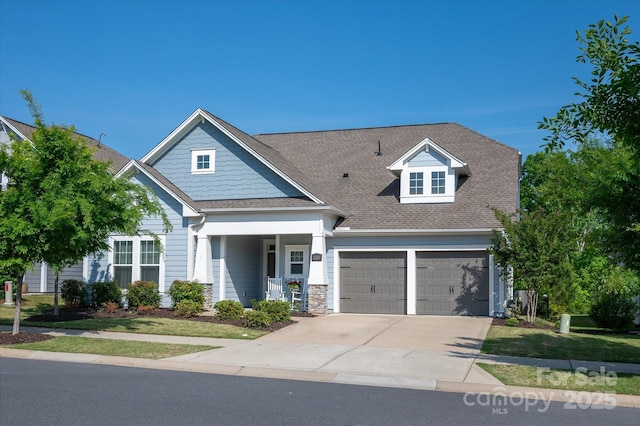 1260 Thomas Knapp Pkwy, Fort Mill, SC 29715 - view of front of property with covered porch, a shingled roof, and concrete driveway