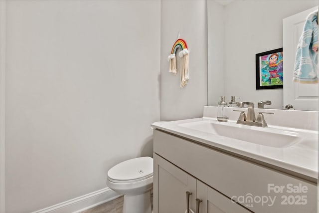 1260 Thomas Knapp Pkwy, Fort Mill, SC 29715 - half bathroom featuring vanity, baseboards, and toilet