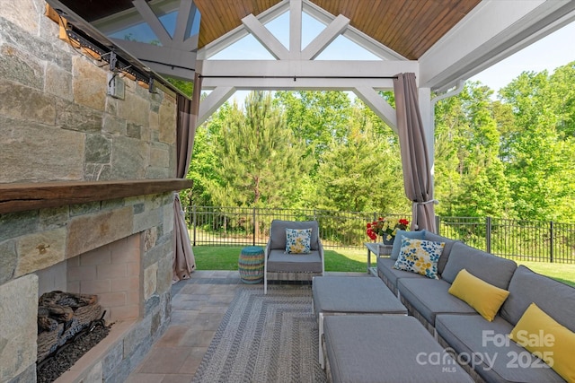 1260 Thomas Knapp Pkwy, Fort Mill, SC 29715 - view of patio / terrace with a gazebo, an outdoor living space with a fireplace, and fence