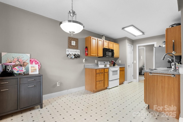kitchen with black microwave, baseboards, freestanding refrigerator, light floors, and white electric range oven