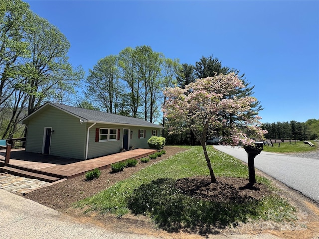 view of front of home with a deck