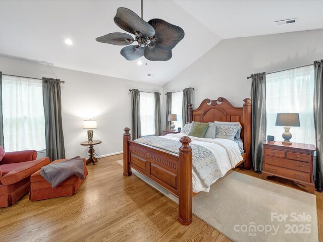 3133 English Sparrow Ln, Charlotte, NC 28210 - bedroom featuring vaulted ceiling, ceiling fan, light wood-style flooring, and visible vents