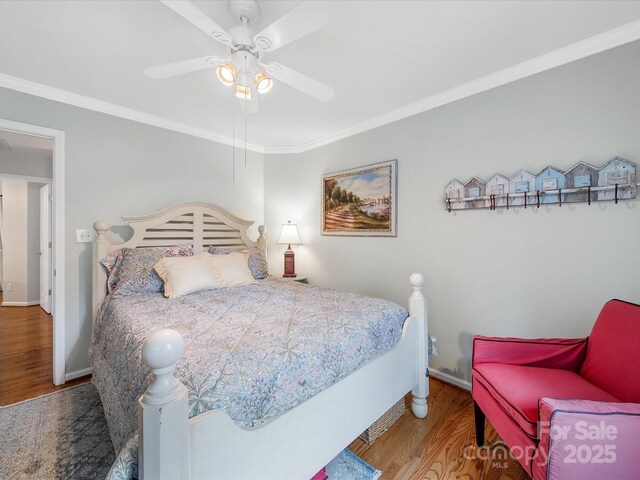 3133 English Sparrow Ln, Charlotte, NC 28210 - bedroom with ceiling fan, wood finished floors, baseboards, and ornamental molding