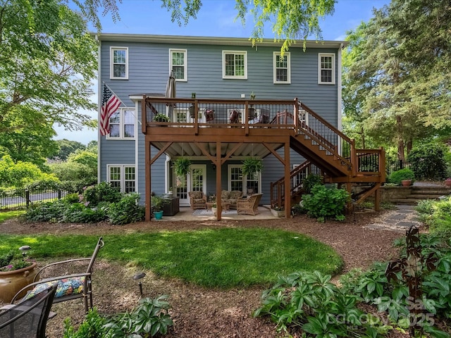 3133 English Sparrow Ln, Charlotte, NC 28210 - back of property with a patio, fence, a wooden deck, stairway, and an outdoor hangout area