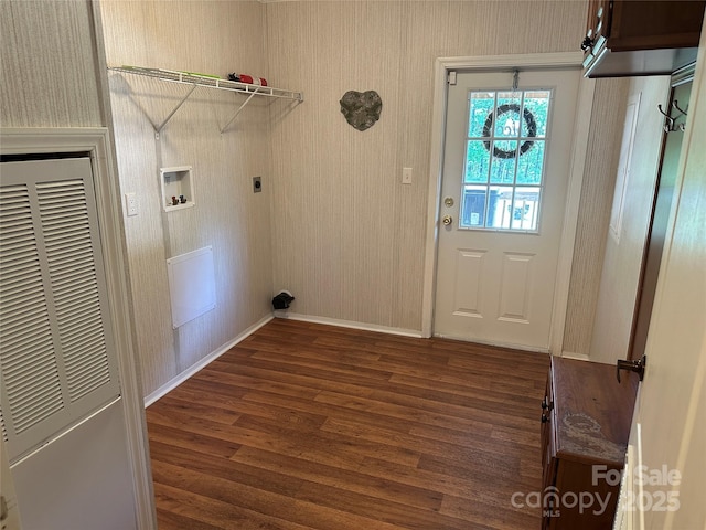 laundry area featuring washer hookup, laundry area, baseboards, dark wood-style floors, and a heating unit