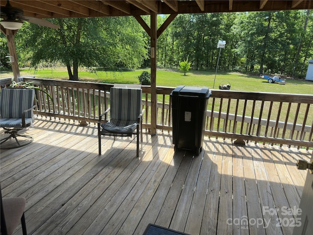 wooden deck with a yard