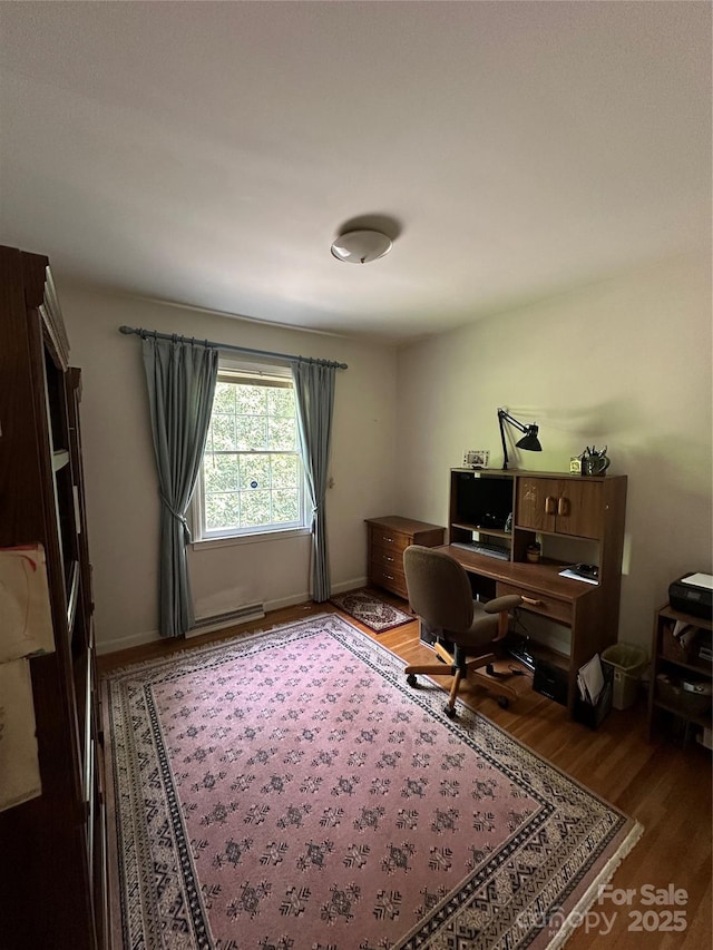 office with baseboards and wood finished floors