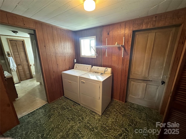213 S Main St, Jefferson, SC 29718 - laundry room with separate washer and dryer, wooden walls, tile patterned floors, and wood ceiling
