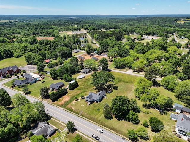 213 S Main St, Jefferson, SC 29718 - aerial perspective of suburban area featuring a forest