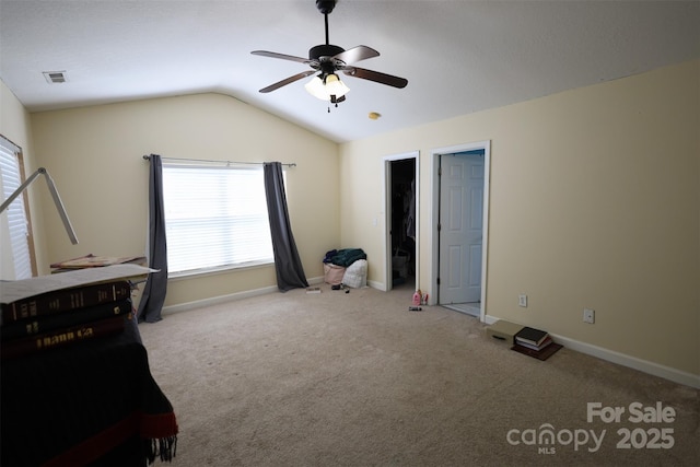 6614 Wicked Oak Ln, Charlotte, NC 28216 - unfurnished bedroom with vaulted ceiling, multiple windows, carpet floors, and ceiling fan
