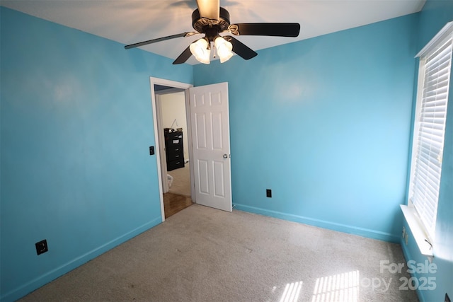 6614 Wicked Oak Ln, Charlotte, NC 28216 - unfurnished bedroom featuring carpet flooring and ceiling fan