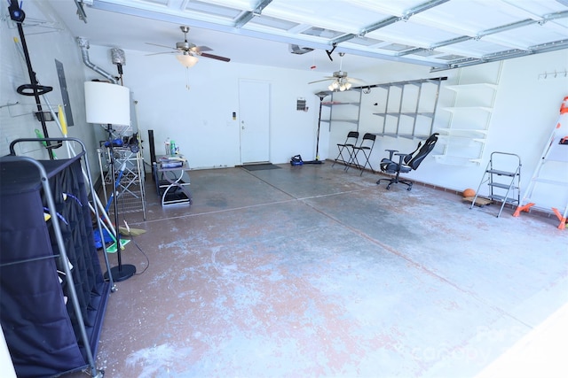 6614 Wicked Oak Ln, Charlotte, NC 28216 - garage featuring a ceiling fan and a garage door opener
