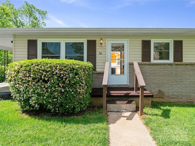 92 Church St, Weaverville, NC 28787 - view of front of house featuring a front lawn