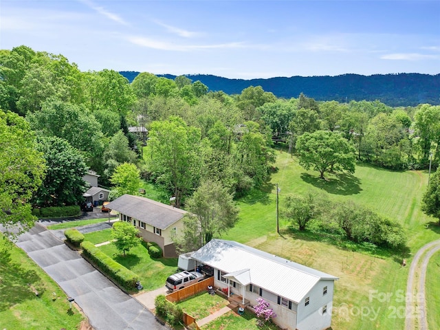 92 Church St, Weaverville, NC 28787 - aerial view of property and surrounding area featuring a heavily wooded area